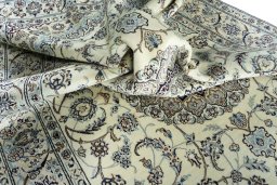 Surface texture of New Nain rug with natural Wool and intricate pattern