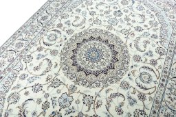 Backside of handmade New Nain rug showing knot structure and weave density