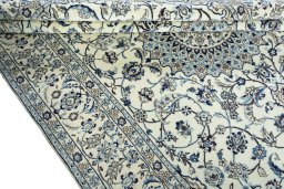 Close-up detail of 2000s Nain rug from Iran / Persia showing Wool weave