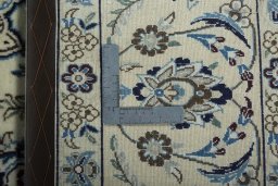 Backside of handmade 2000s Nain rug showing knot structure and weave density