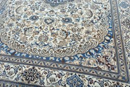 Close-up detail of New Nain rug from Iran / Persia showing Wool weave
