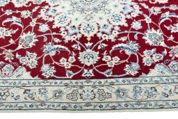 Corner detail of New Nain rug showing border pattern and Wool pile