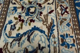 Central medallion detail of 2000s Nain rug from Iran / Persia
