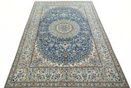 Surface texture of 2000s Nain rug with natural Wool and intricate pattern