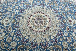 Central medallion detail of 2000s Nain rug from Iran / Persia