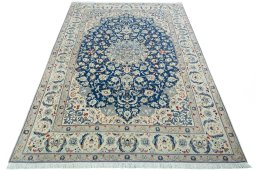 Surface texture of 2000s Nain rug with natural Wool and intricate pattern