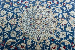 Central medallion detail of 2000s Nain rug from Iran / Persia
