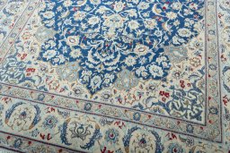 Close-up detail of 2000s Nain rug from Iran / Persia showing Wool weave