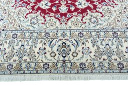Full view of 2000s Nain rug from Iran / Persia, 305 × 200 cm in Red tones