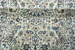 Close-up detail of 2000s Nain rug from Iran / Persia showing Wool weave