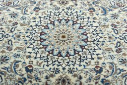Central medallion detail of 2000s Nain rug from Iran / Persia