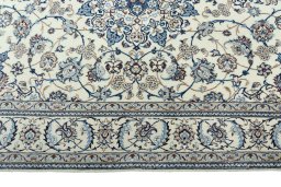 Corner detail of New Nain rug showing border pattern and Cork pile
