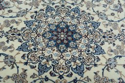 Central medallion detail of New Nain rug from Iran / Persia