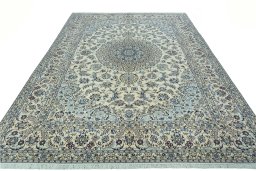 Surface texture of 2000s Nain rug with natural Wool and intricate pattern