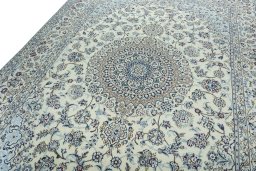 Backside of handmade 2000s Nain rug showing knot structure and weave density