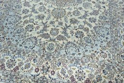 Close-up detail of 2000s Nain rug from Iran / Persia showing Wool weave