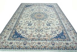 Surface texture of 2000s Nain rug with natural Wool and intricate pattern
