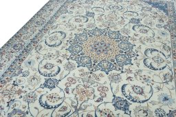 Backside of handmade 2000s Nain rug showing knot structure and weave density