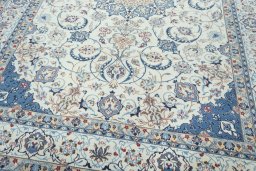 Close-up detail of 2000s Nain rug from Iran / Persia showing Wool weave