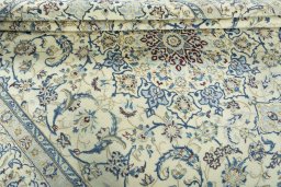 Close-up detail of 2000s Nain rug from Iran / Persia showing Wool weave