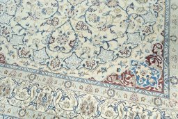 Close-up detail of 2000s Nain rug from Iran / Persia showing Wool weave