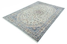 Corner detail of 2000s Nain rug showing border pattern and Wool pile