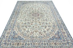 Surface texture of 2000s Nain rug with natural Wool and intricate pattern
