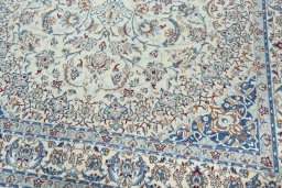 Close-up detail of 2000s Nain rug from Iran / Persia showing Wool weave
