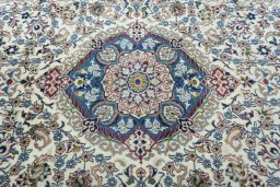 Central medallion detail of 2000s Nain rug from Iran / Persia