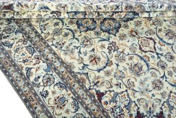 Close-up detail of 2000s Nain rug from Iran / Persia showing Wool weave