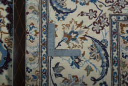 Backside of handmade 2000s Nain rug showing knot structure and weave density
