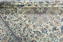 Close-up detail of 2000s Nain rug from Iran / Persia showing Wool weave