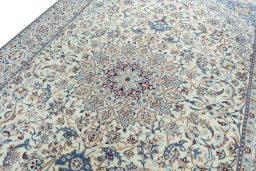 Backside of handmade 2000s Nain rug showing knot structure and weave density