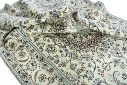 Surface texture of New Nain rug with natural Wool and intricate pattern
