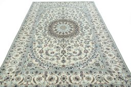 Surface texture of New Nain rug with natural Wool and intricate pattern