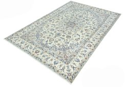 Corner detail of New Nain rug showing border pattern and Wool pile