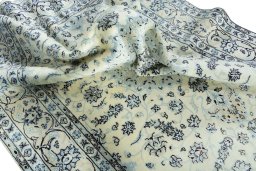 Surface texture of New Nain rug with natural Wool and intricate pattern