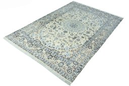 Corner detail of New Nain rug showing border pattern and Wool pile