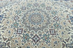 Central medallion detail of 2000s Nain rug from Iran / Persia