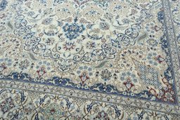 Close-up detail of 2000s Nain rug from Iran / Persia showing Wool weave