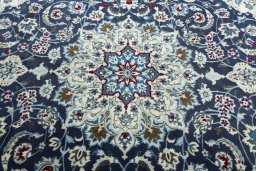 Central medallion detail of 2000s Nain rug from Iran / Persia