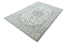 Corner detail of 2000s Nain rug showing border pattern and Wool pile