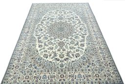 Surface texture of 2000s Nain rug with natural Wool and intricate pattern