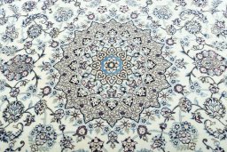 Central medallion detail of 2000s Nain rug from Iran / Persia