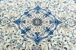 Central medallion detail of 2000s Nain rug from Iran / Persia