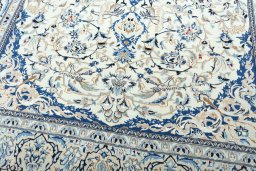 Close-up detail of 2000s Nain rug from Iran / Persia showing Wool weave