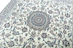 Backside of handmade 2000s Nain rug showing knot structure and weave density