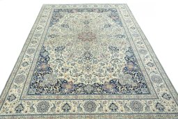Surface texture of 1970s Nain rug with natural Wool and intricate pattern