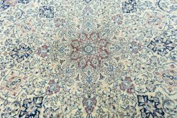 Central medallion detail of 1970s Nain rug from Iran / Persia