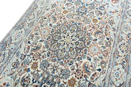Backside of handmade 2000s Nain rug showing knot structure and weave density